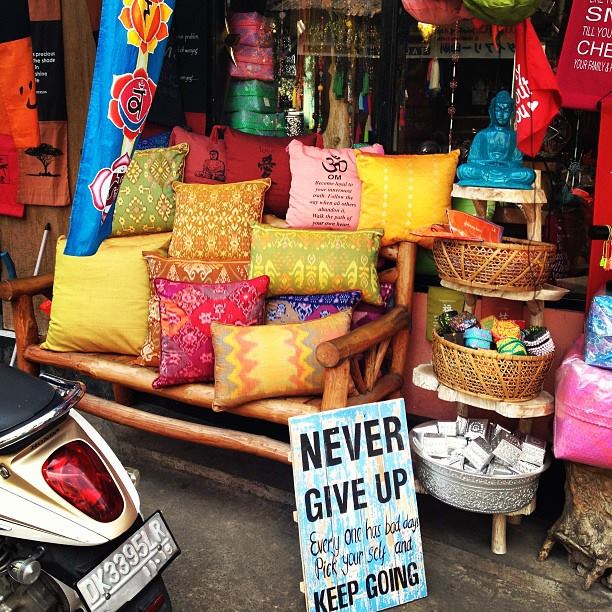 Om pillow and never give up sign!